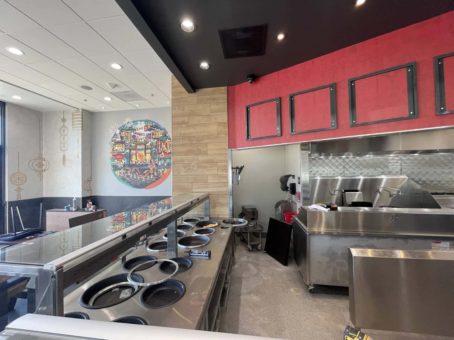 Commercial wallcovering along a restaurant service line and kitchen