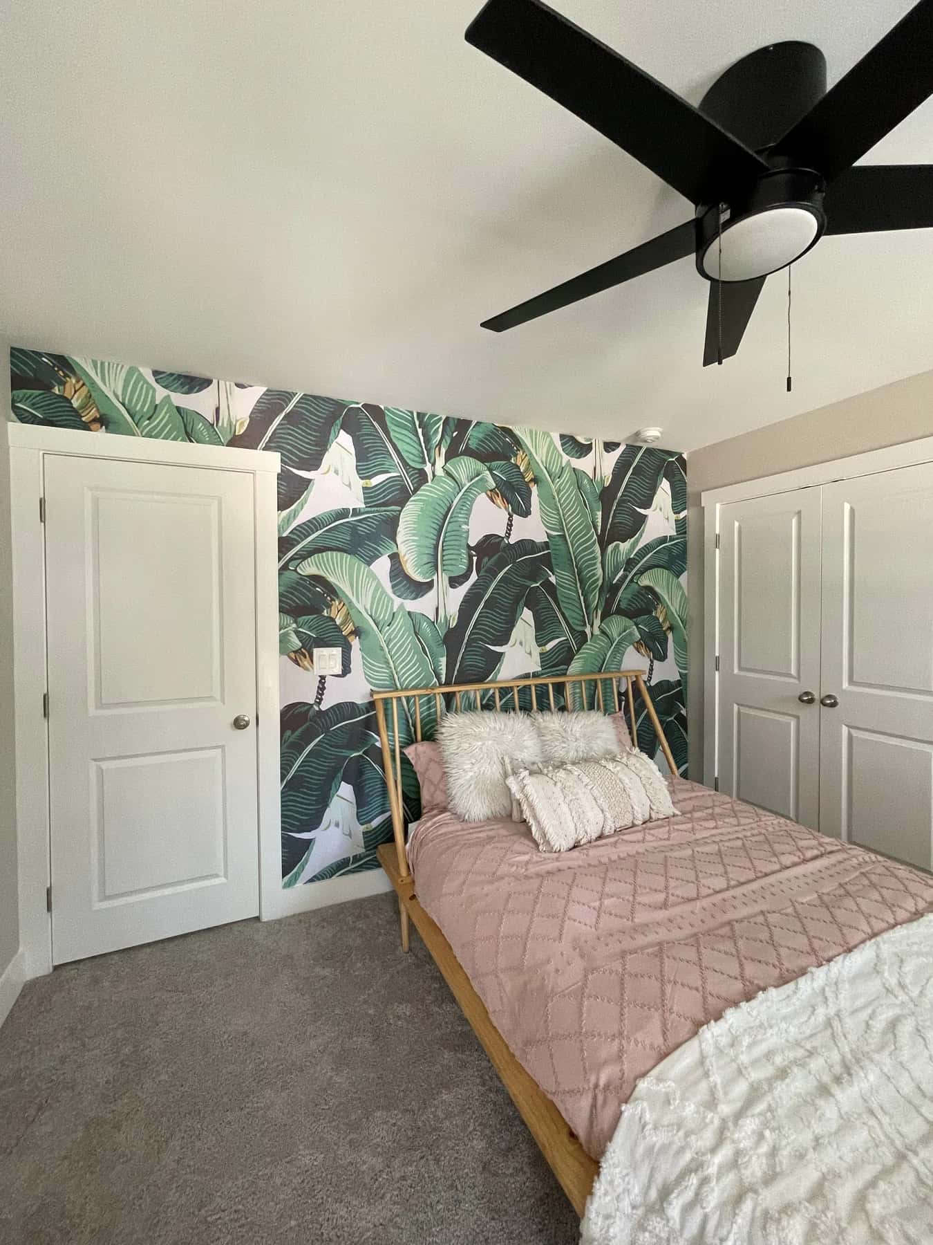 Tropical leaf mural in a child's bedroom