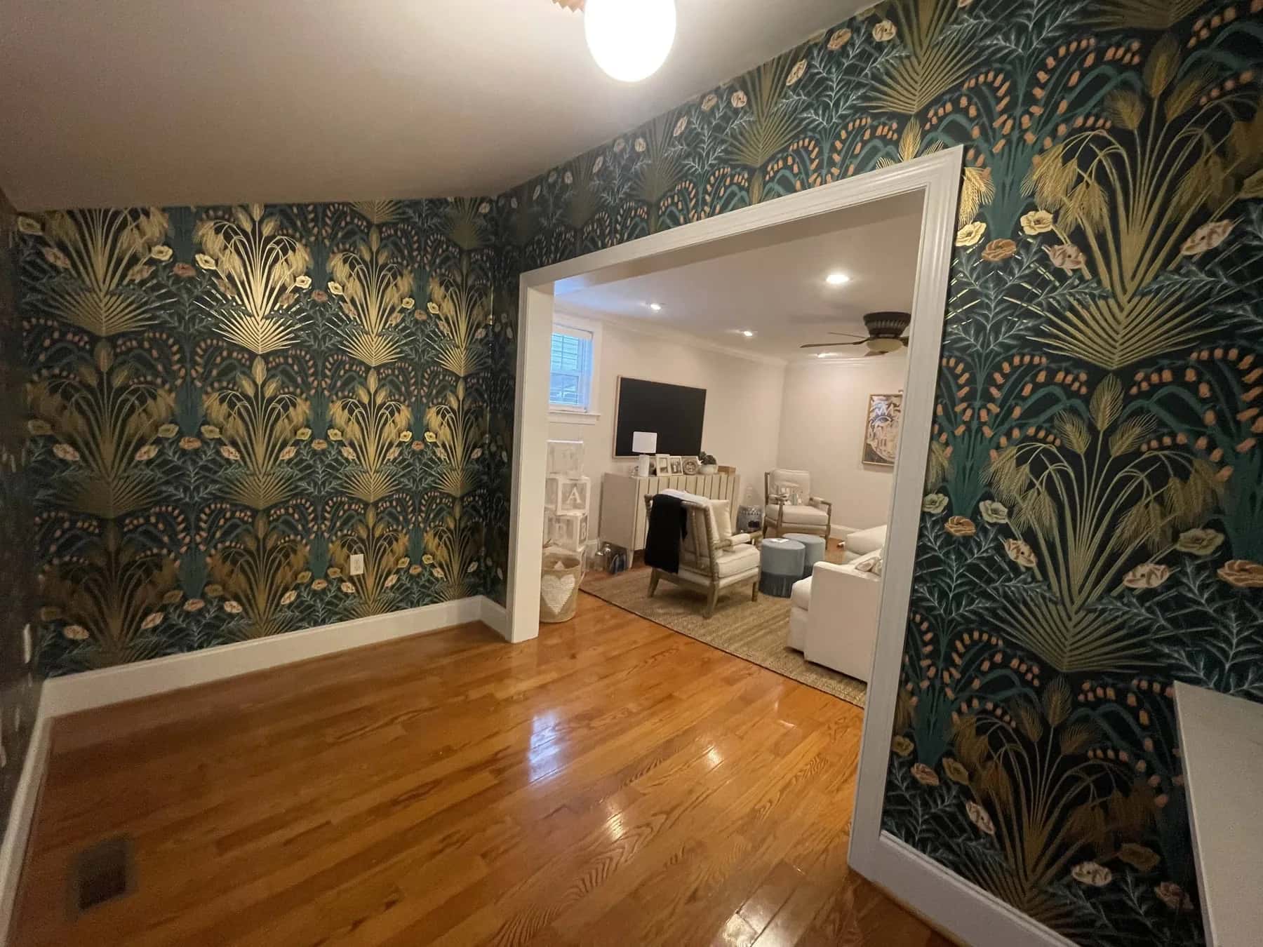 Green Morris-style peacock wallpaper in a Charlotte hallway