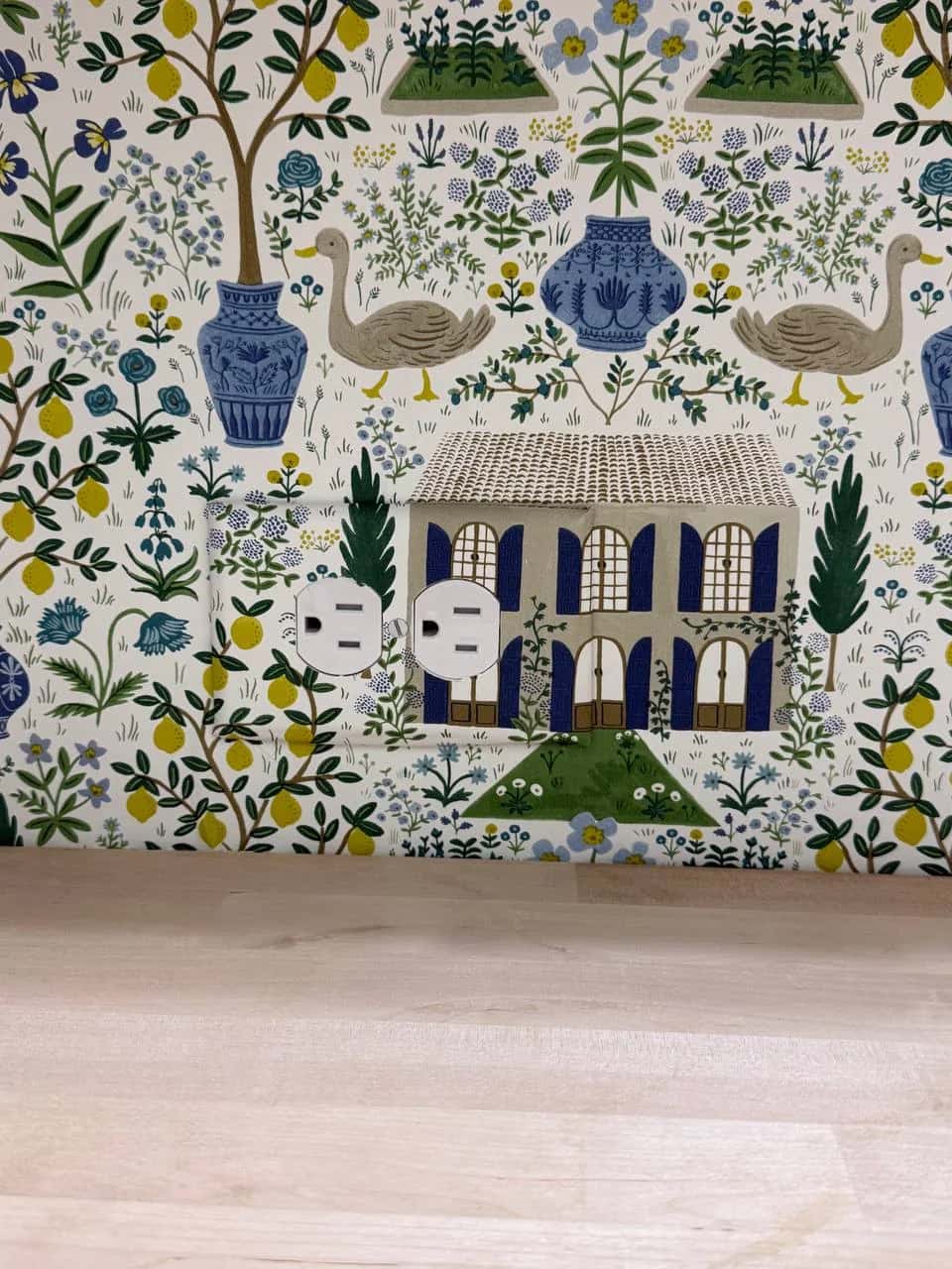 Botanical wallpaper with houses and swans, close detail