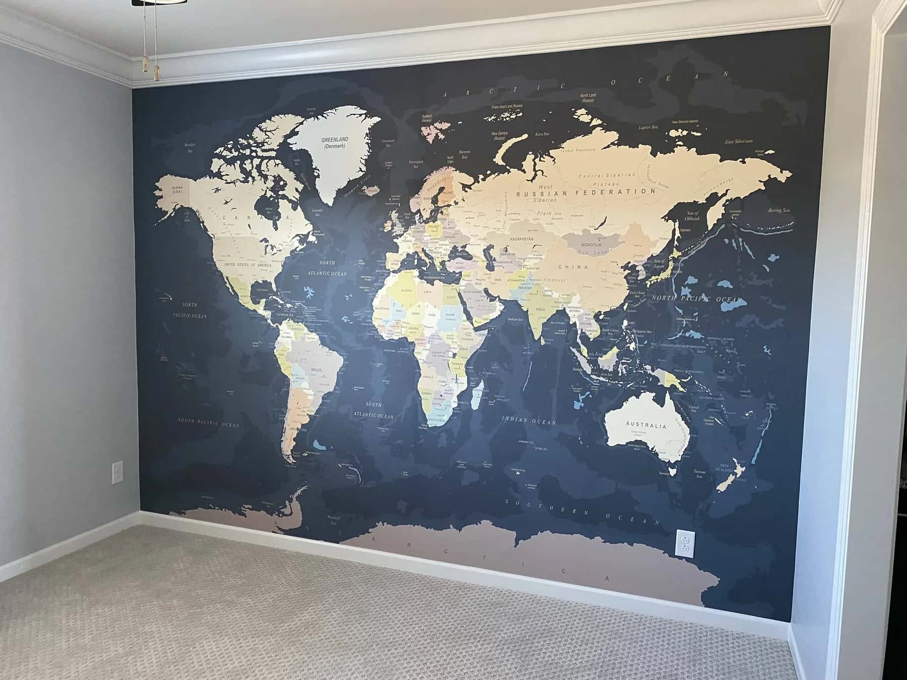 World map mural covering a full wall